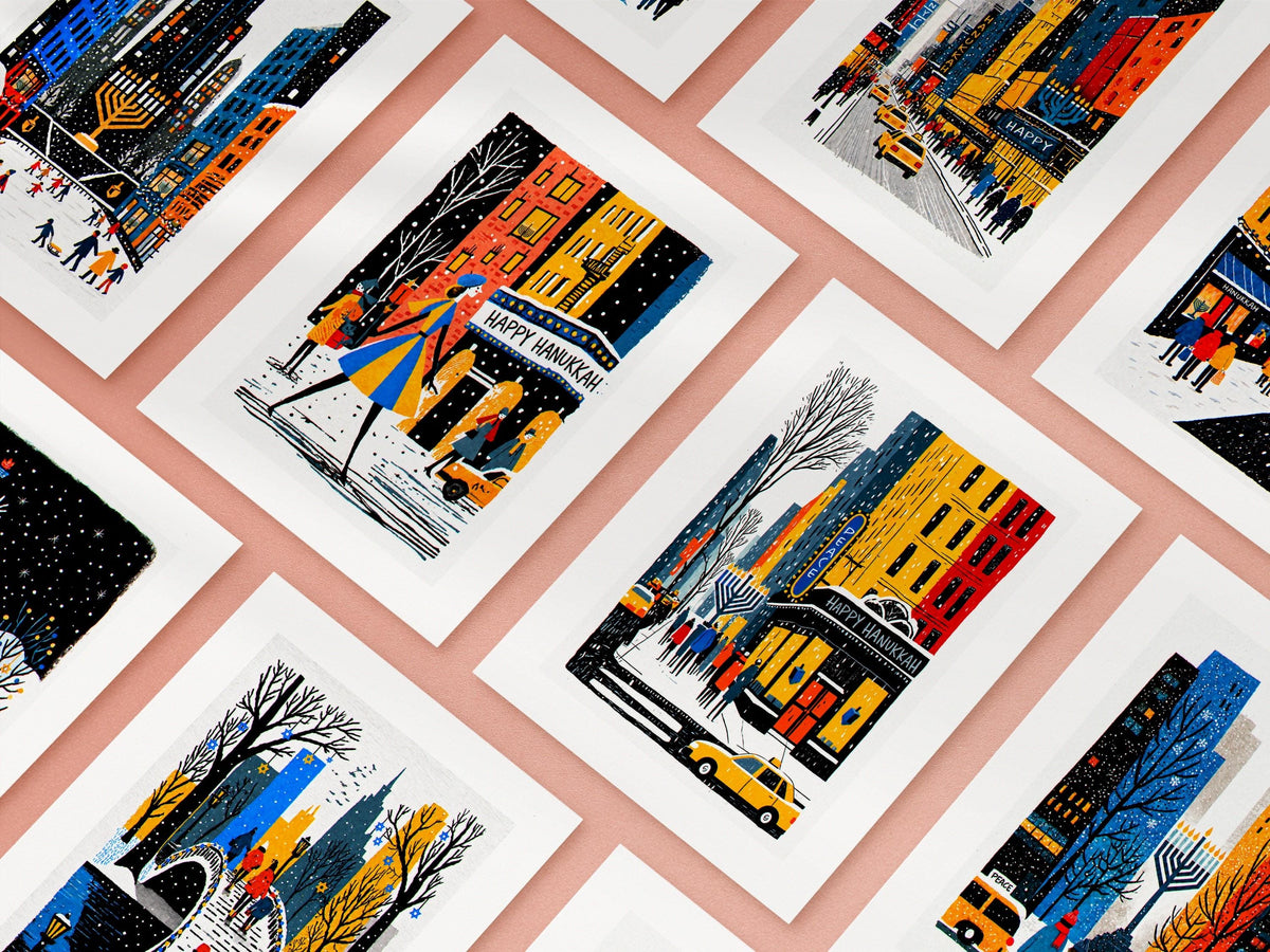 Ten New York City Lights Hanukkah cards arranged in a grid, the full set of bold folk art designs