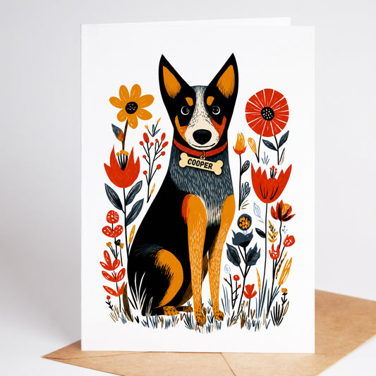 Personalized Blue Heeler sympathy card with the name Cooper on a dog tag, standing on a kraft envelope