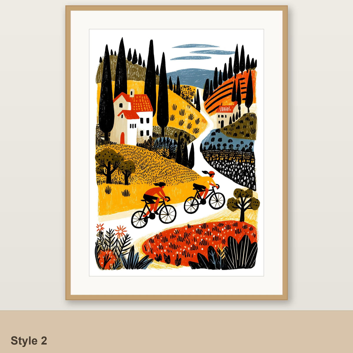 Female cycling art print Style 2, hillside village with two riders, framed linocut style folk art