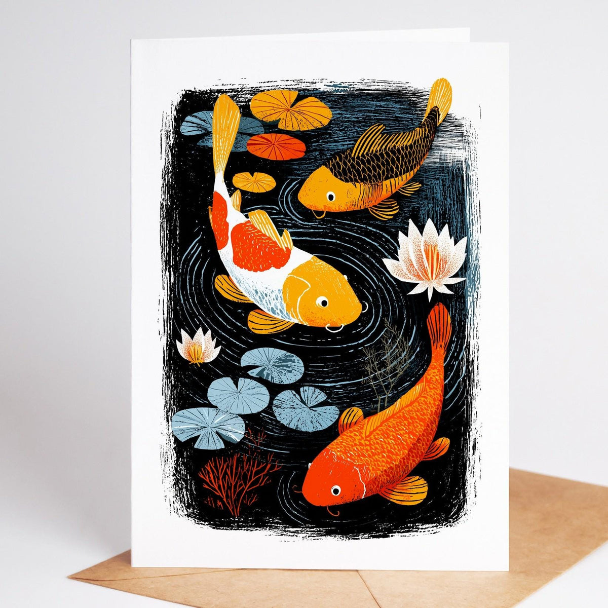 Koi card, white and orange koi turning between blue lily pads and a pink lily