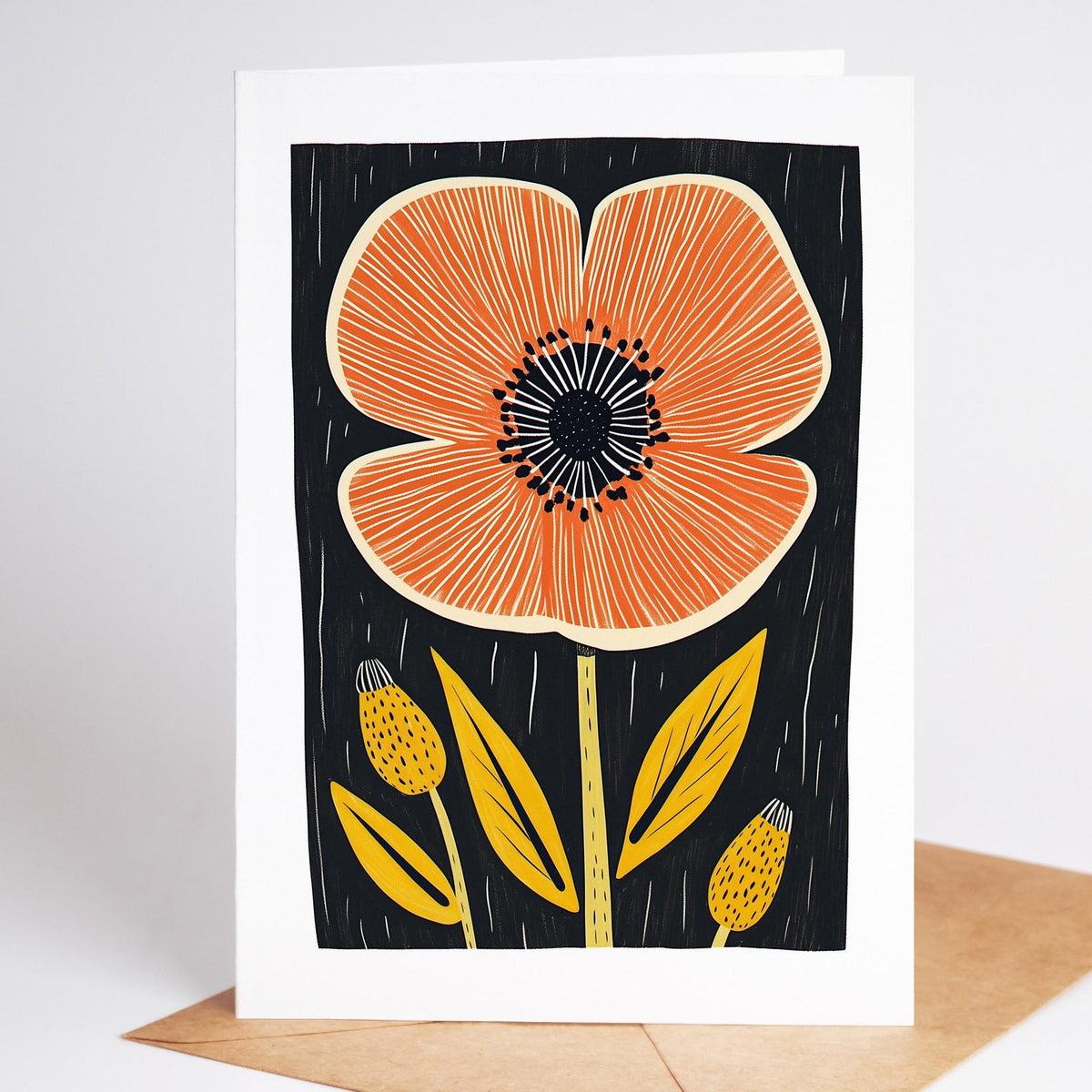 Mid century modern floral card standing on a kraft envelope, a big orange poppy with yellow buds on black