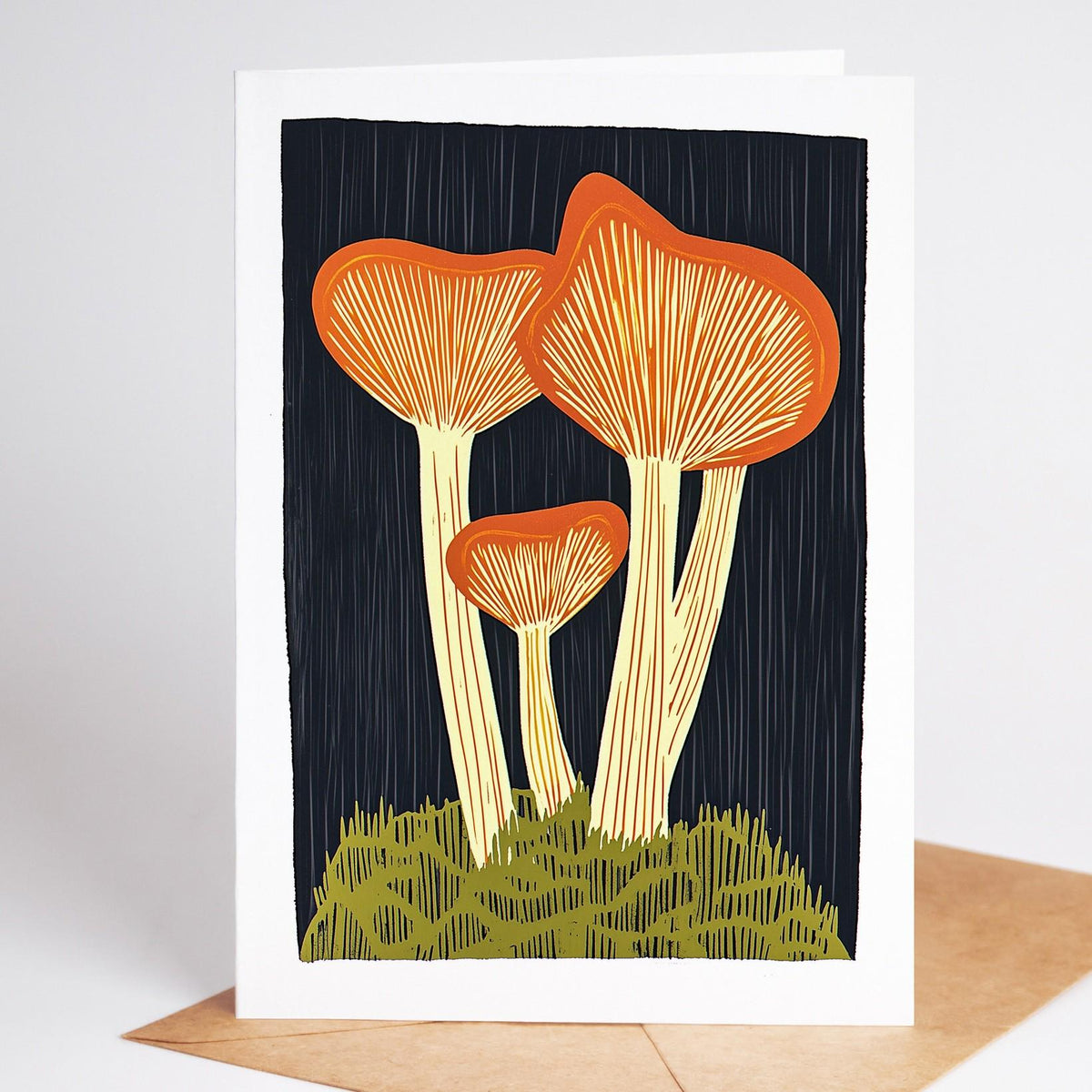 Mushroom card, golden chanterelles rising from green moss