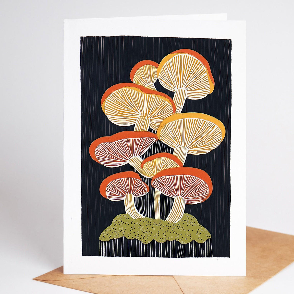 Mushroom card, a cluster of pink and orange mushrooms on a mossy mound