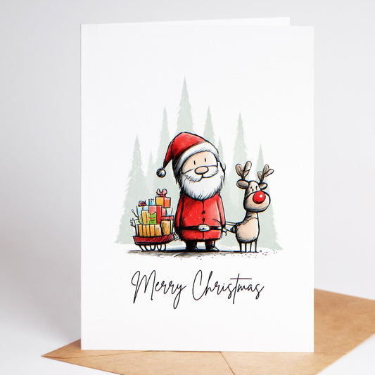 Santa and reindeer Christmas card standing on a kraft envelope, Merry Christmas script
