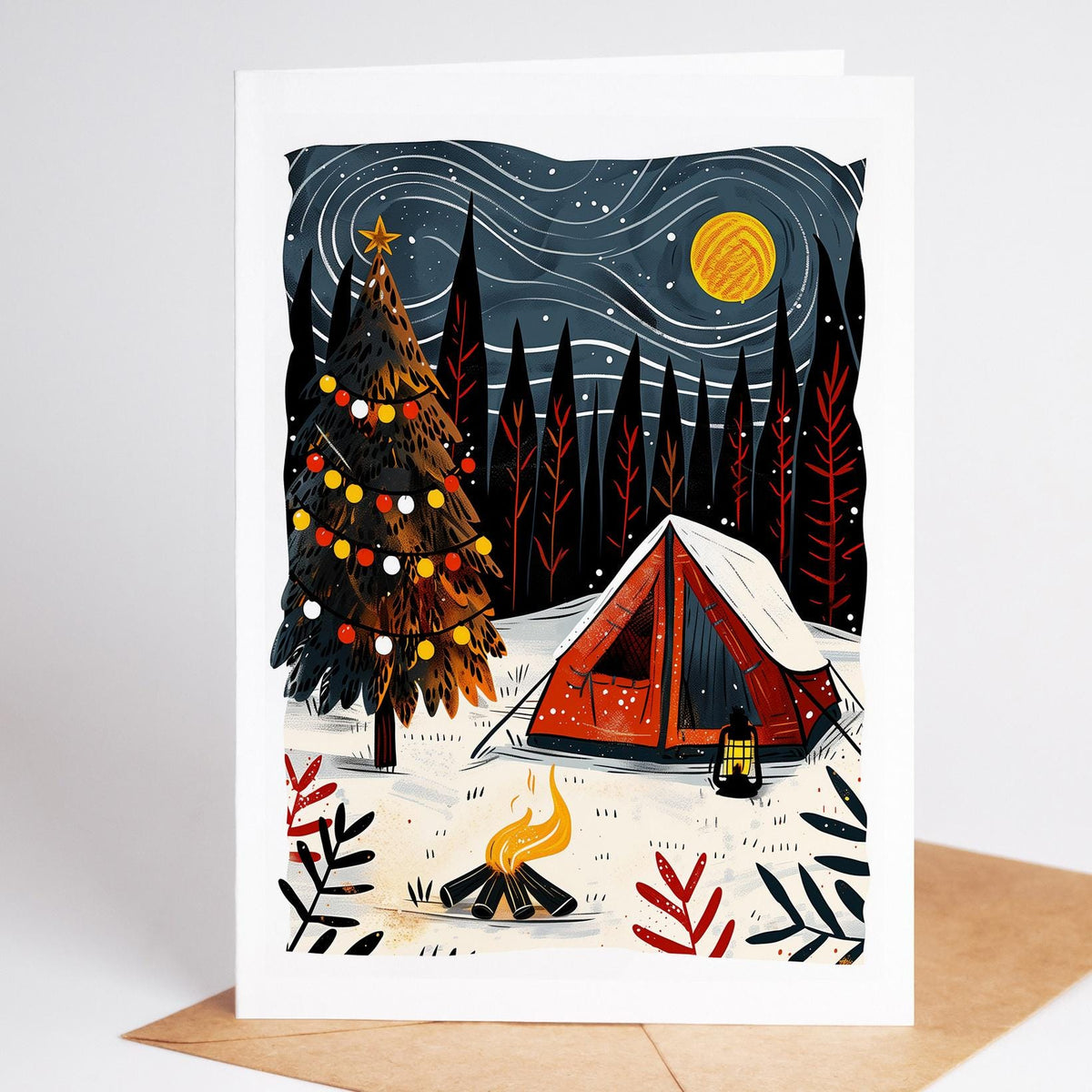 Camping Christmas card of a glowing red tent beside a decorated Christmas tree