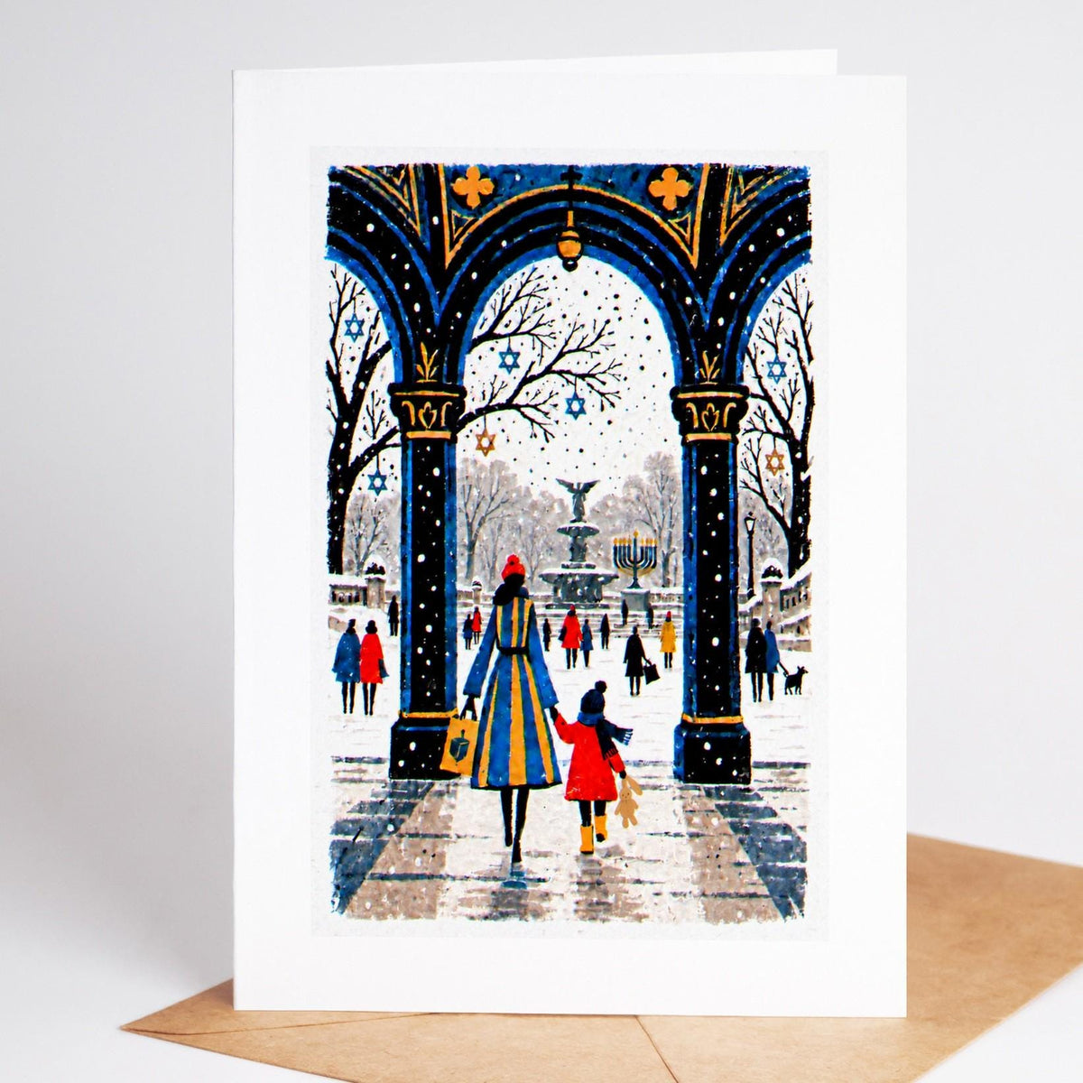 New York Hanukkah card standing upright, the Bethesda Terrace arcade in Central Park with a lit menorah by the fountain