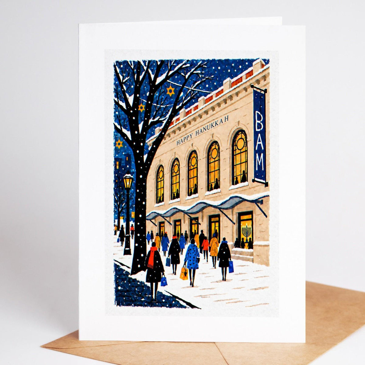 Brooklyn Hanukkah card standing with envelope, the BAM marquee reading Happy Hanukkah with a menorah in the lobby