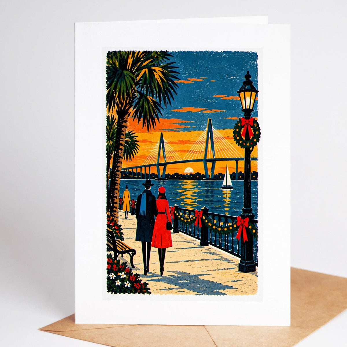 Charleston Christmas card standing with envelope, the Ravenel Bridge cables above the harbour at sunset