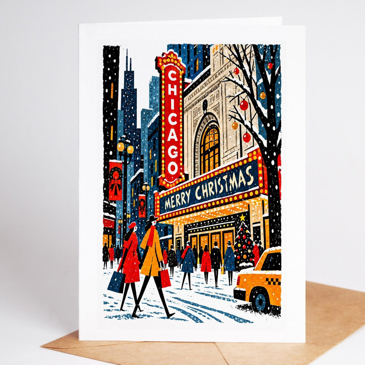 Chicago Christmas card standing upright, the Chicago Theatre marquee glowing over State Street in the snow