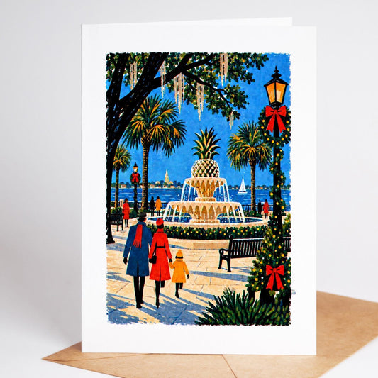 Charleston Christmas card standing upright, the Pineapple Fountain at Waterfront Park lit for the holidays