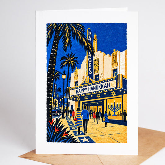 Los Angeles Hanukkah card standing upright, the Pantages Theatre marquee reading Happy Hanukkah