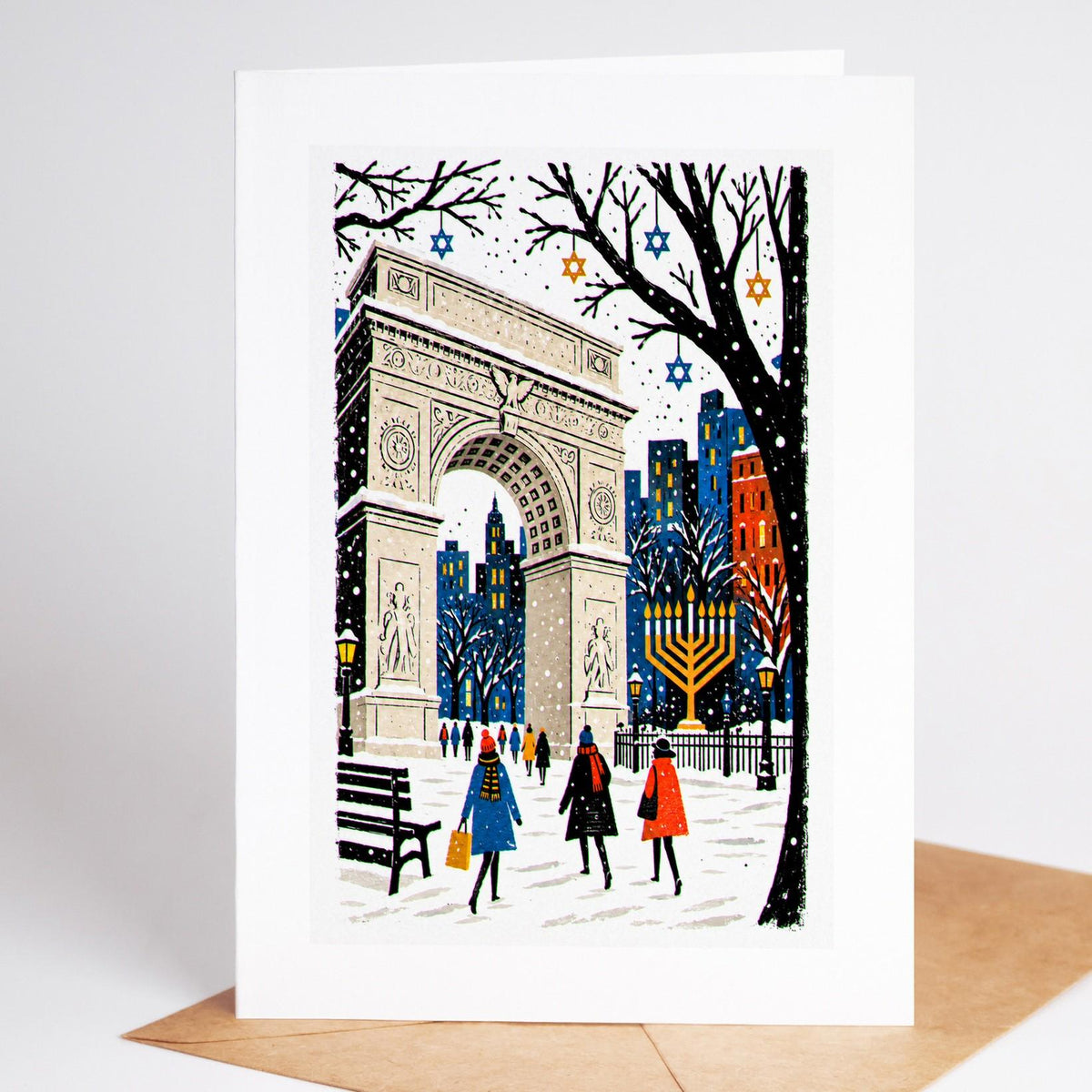 New York Hanukkah card standing with envelope, the Washington Square arch in the snow beside a tall lit menorah