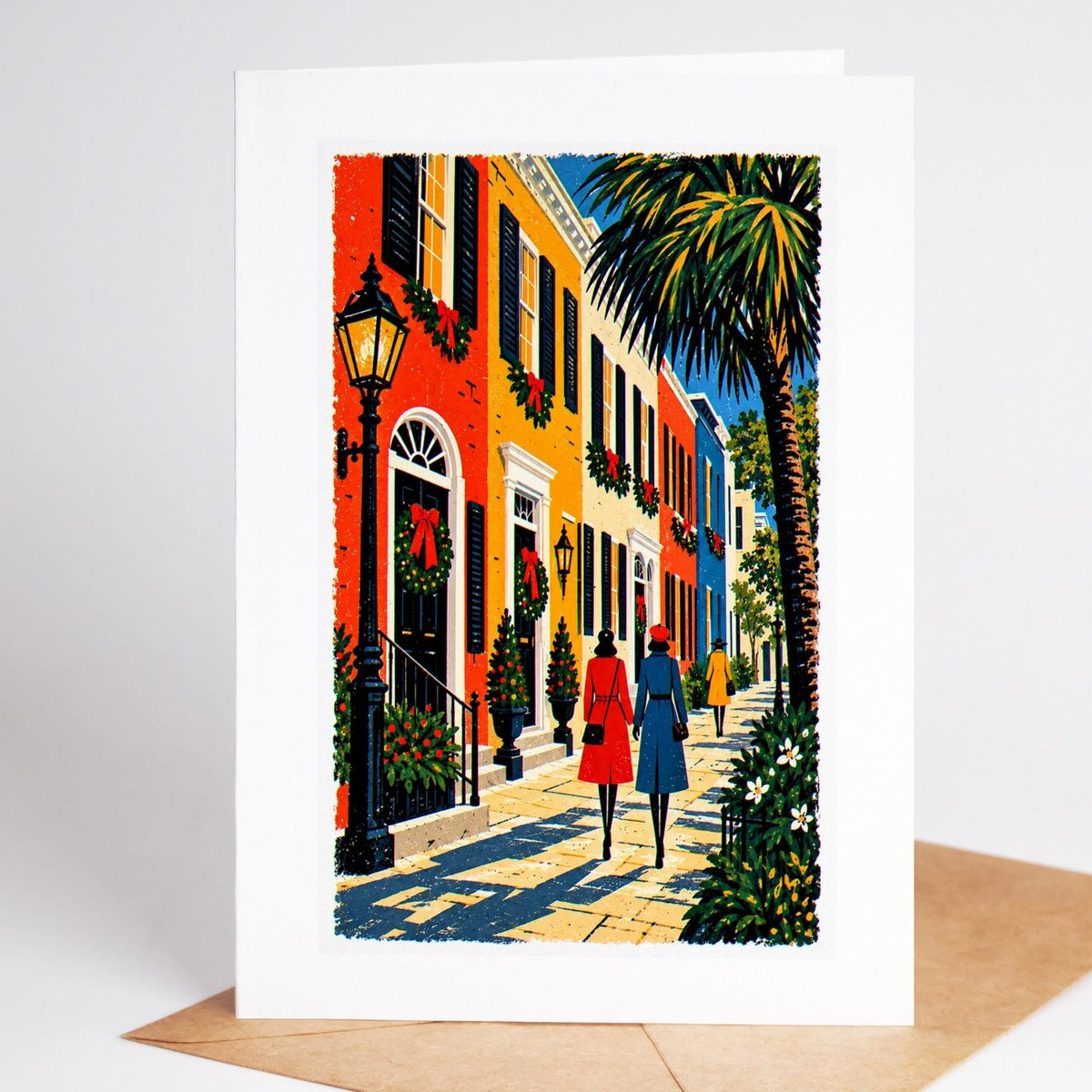 Charleston Christmas card standing with envelope, the pastel houses of Rainbow Row decked in garlands and wreaths
