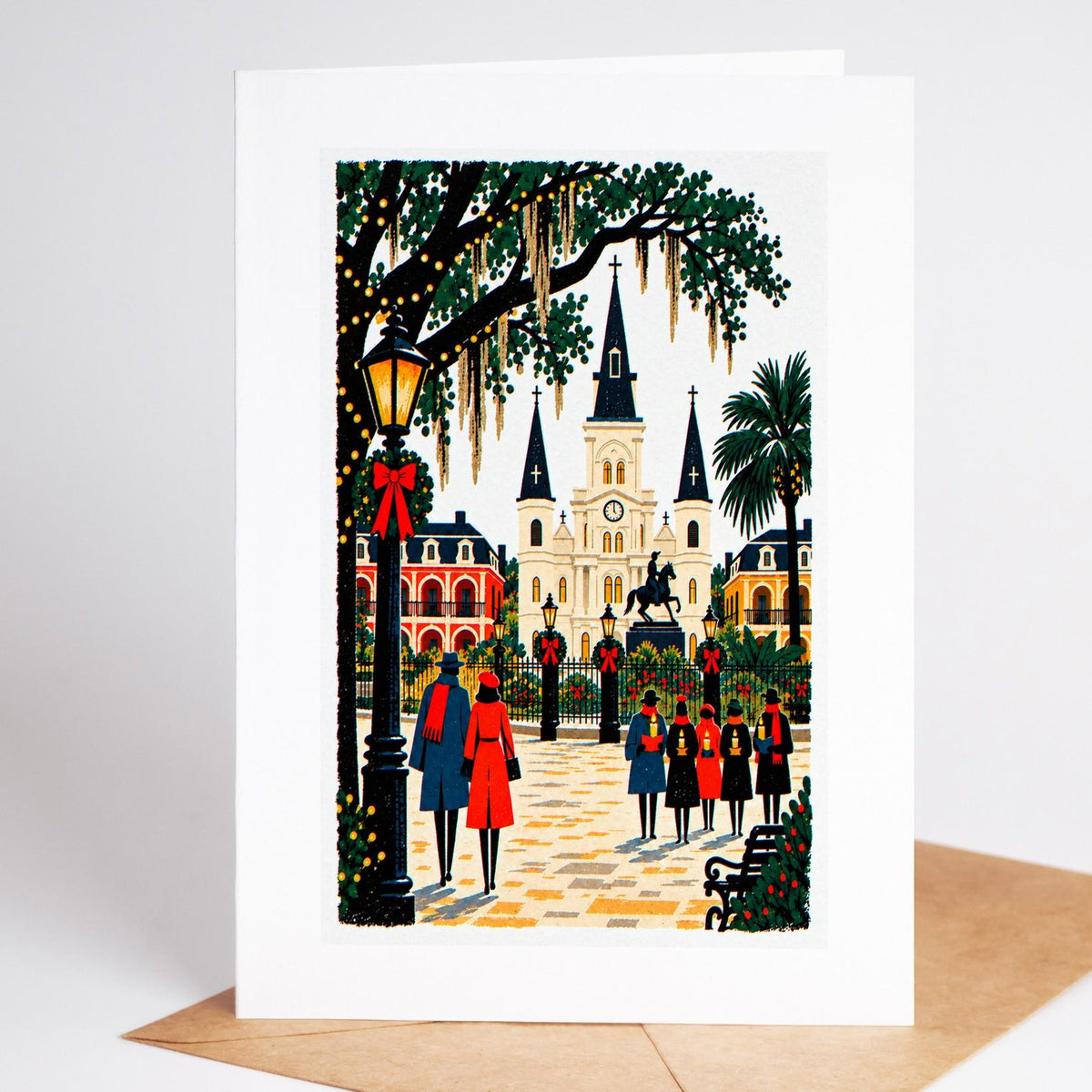 New Orleans Christmas card standing with envelope, Jackson Square and the St Louis Cathedral decked for the holidays