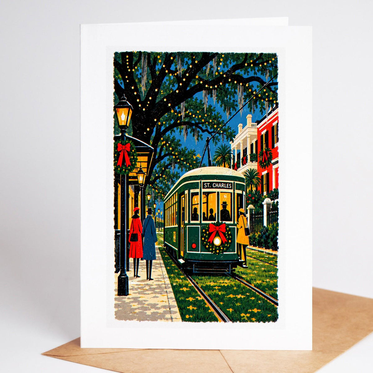 New Orleans Christmas card standing with envelope, the St Charles streetcar under mossy oaks with a wreath on its front