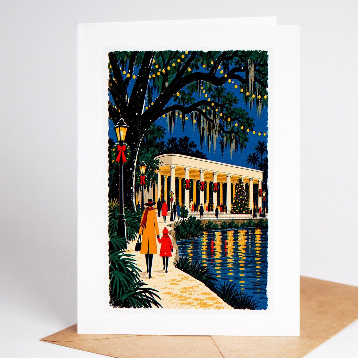New Orleans Christmas card standing with envelope, the City Park peristyle reflected in the lagoon