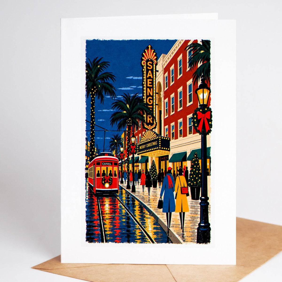 New Orleans Christmas card standing with envelope, the Saenger Theatre marquee reading Merry Christmas above the streetc