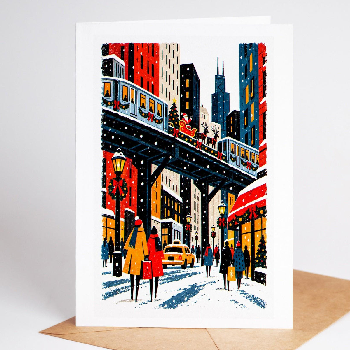 Chicago Christmas card standing upright, the holiday train lit up above the Loop