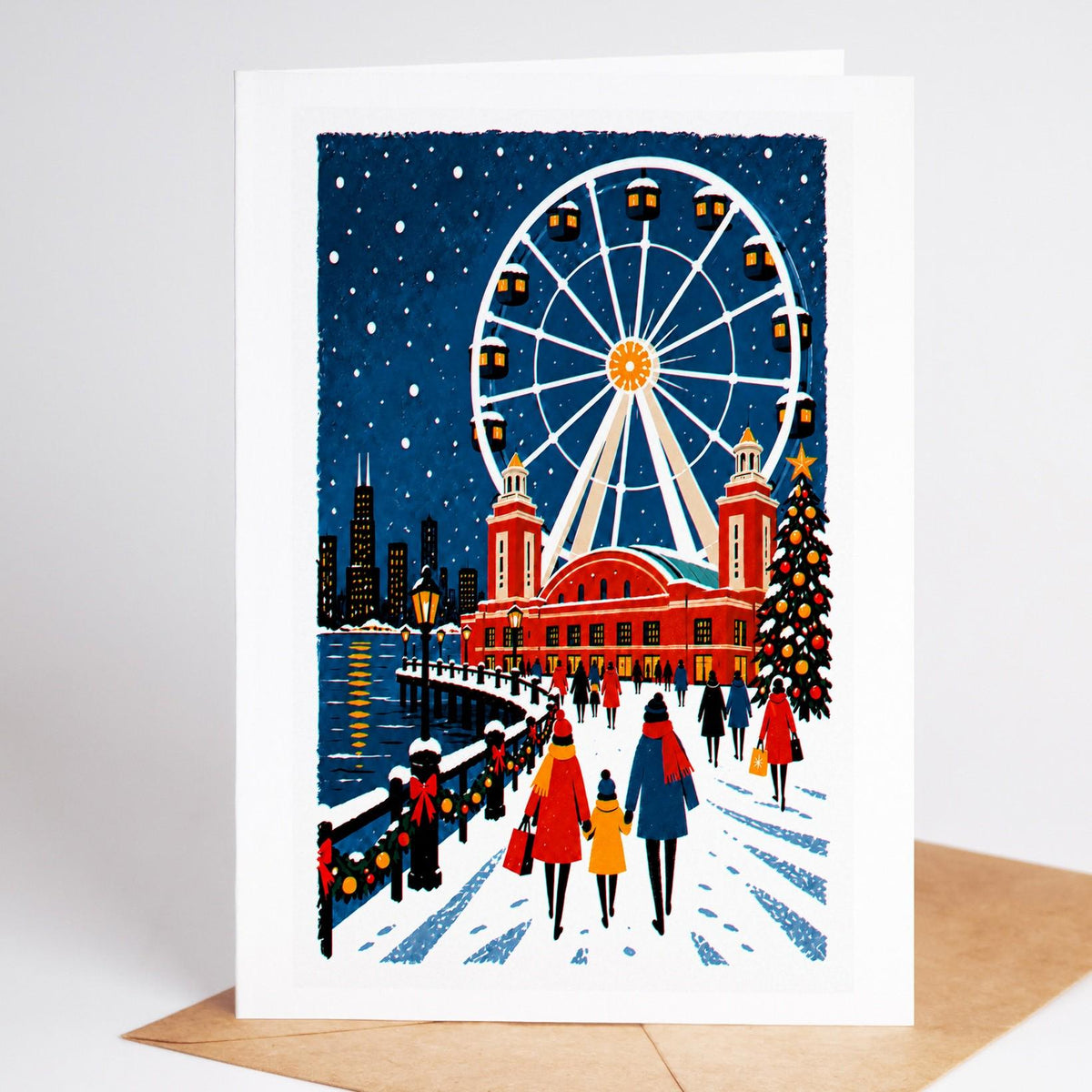 Chicago Christmas card standing with envelope, the Navy Pier Ferris wheel turning above the snowy lakefront