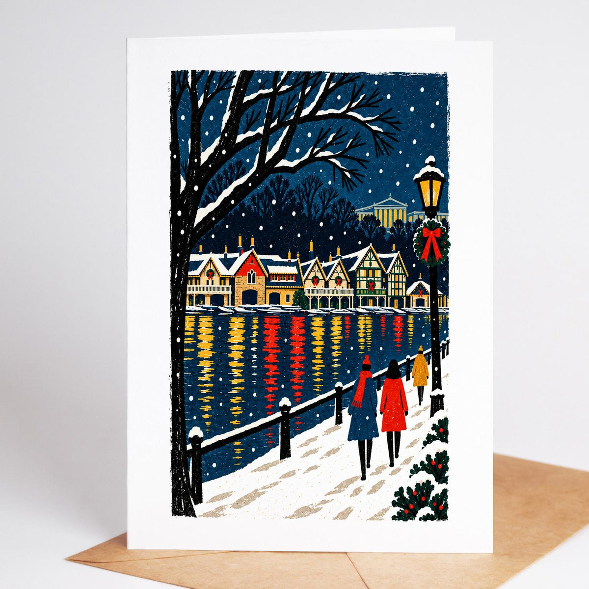 Philadelphia Christmas card standing upright, the lights of Boathouse Row reflected in the Schuylkill