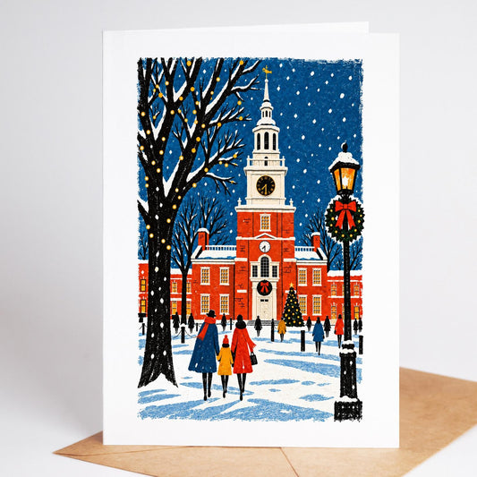 Philadelphia Christmas card standing with envelope, Independence Hall and its clock tower in the falling snow