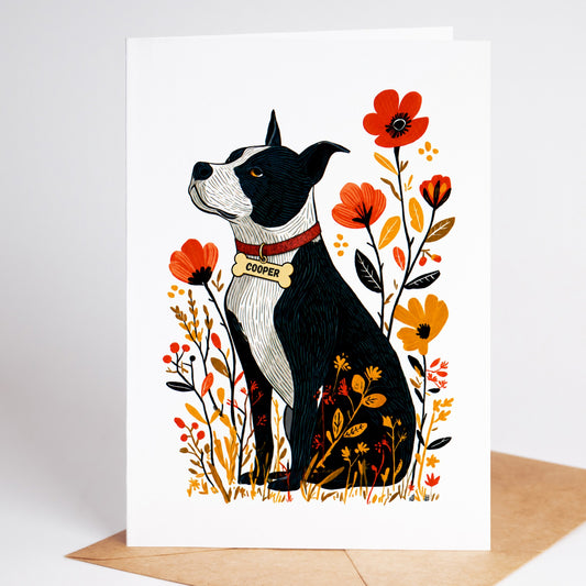 Personalized Pitbull sympathy card with the name Cooper on a dog tag, standing on a kraft envelope